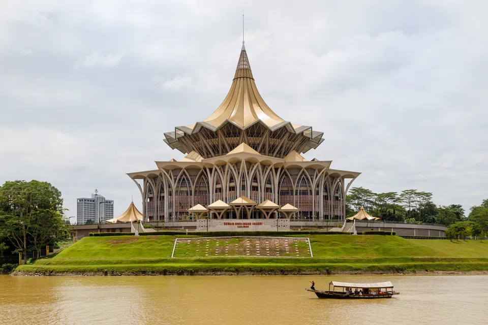 Cigar Kuching and Kota Kinabalu: Borneo's Tobacco Past and Present — golden-roofed Sarawak State Legislative Assembly building across the river in Kuching
